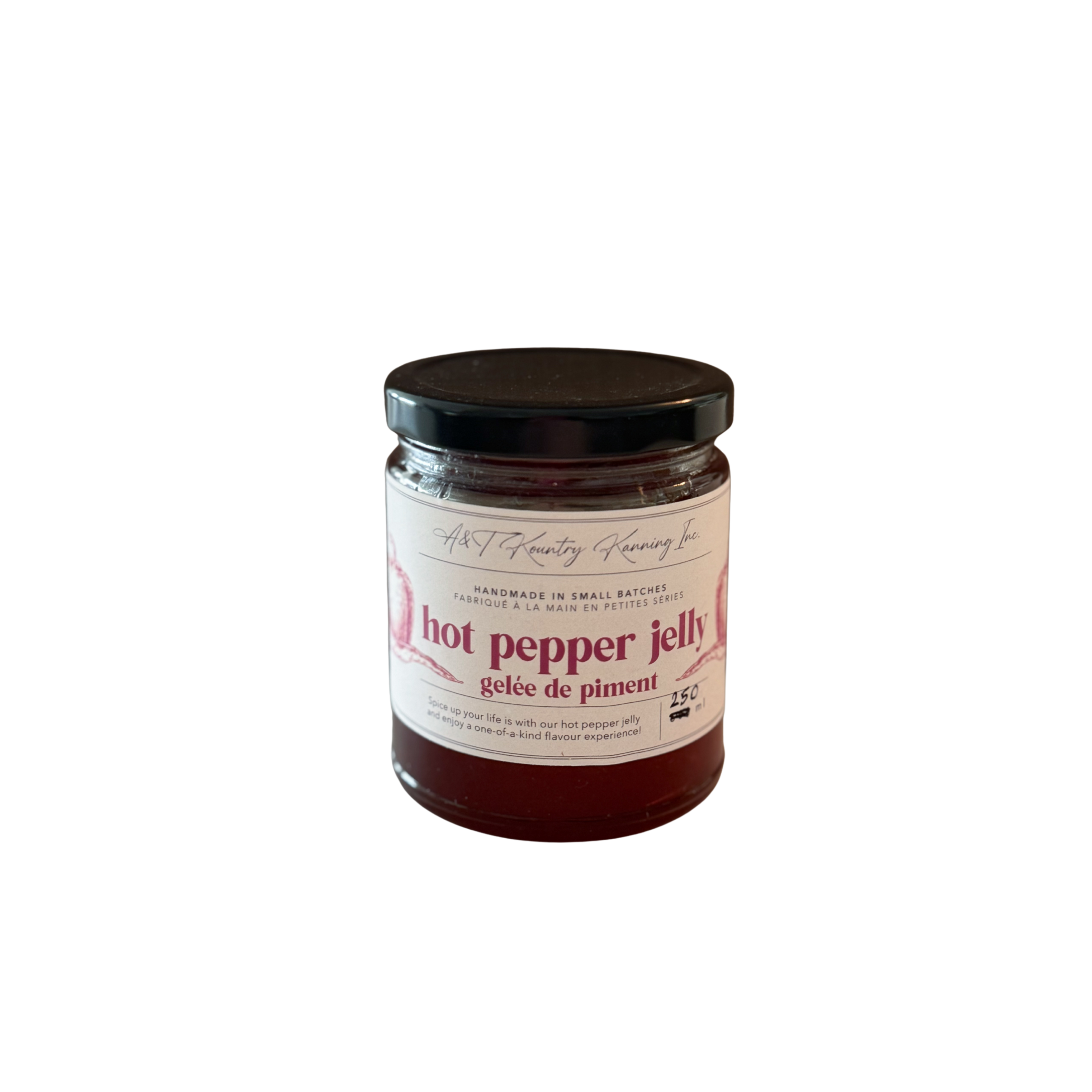 Jar of hot pepper jelly with a black lid on a white background.
